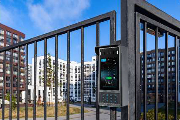 security pad on a black iron fence